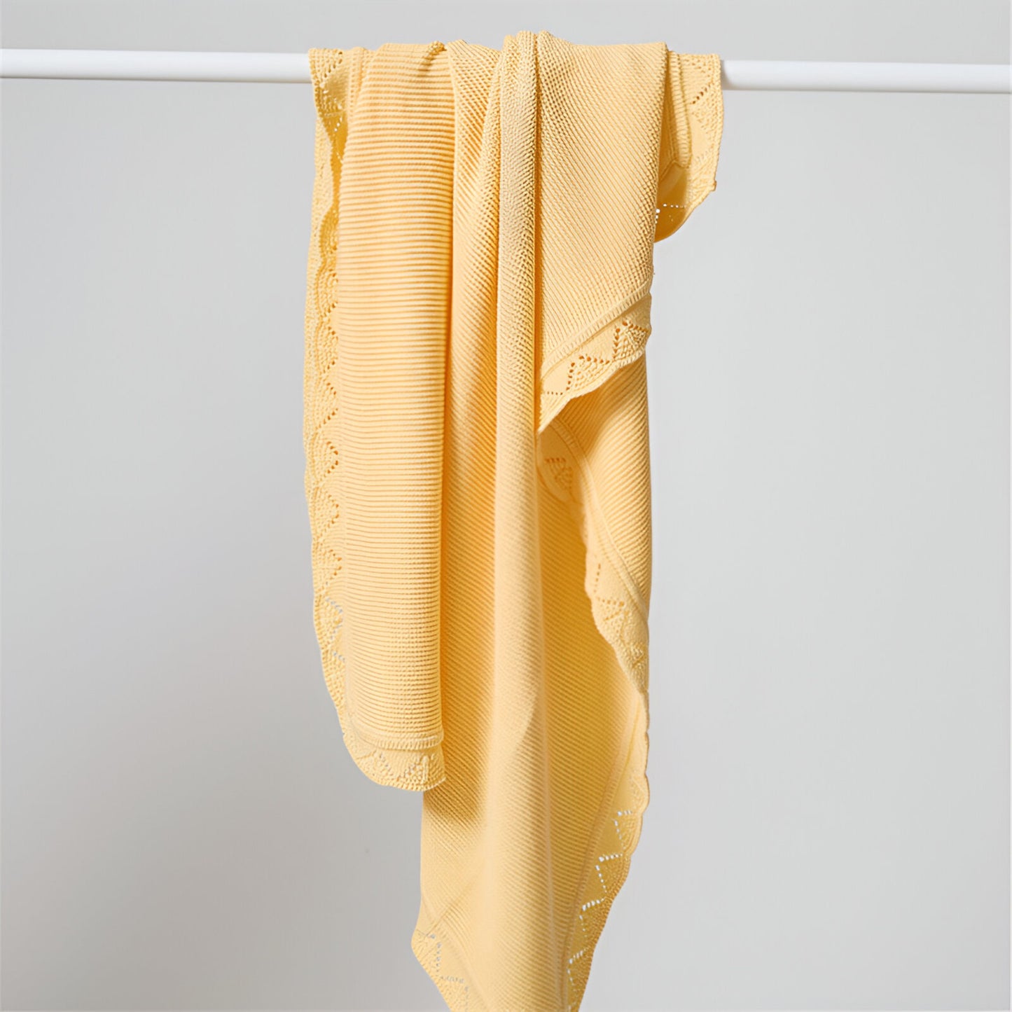 OEKO-TEX® Lullaby Knitted Cotton Blanket, Lemon Yellow - Draped on pole - Bambisserie