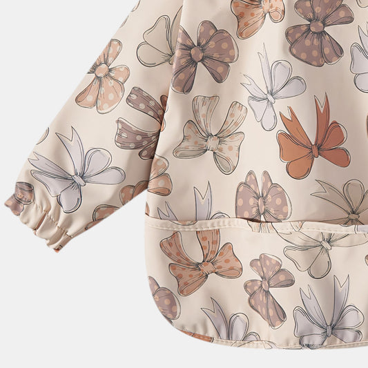 Waterproof Long Sleeve Pocket Bib, Bows - Detail - Bambisserie