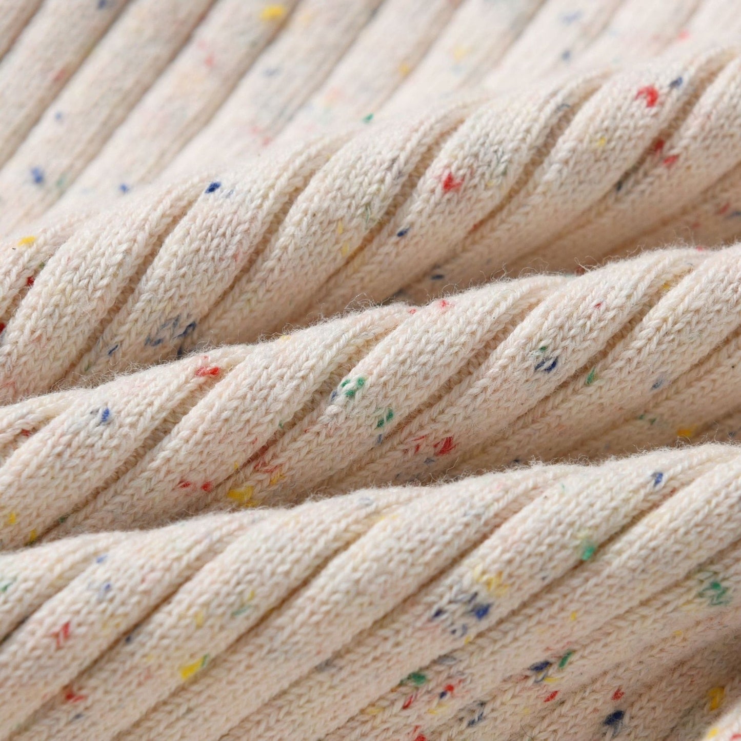 Almond Speckle Knitted Cotton Baby Jumpsuit Fabric Detail - Bambisserie