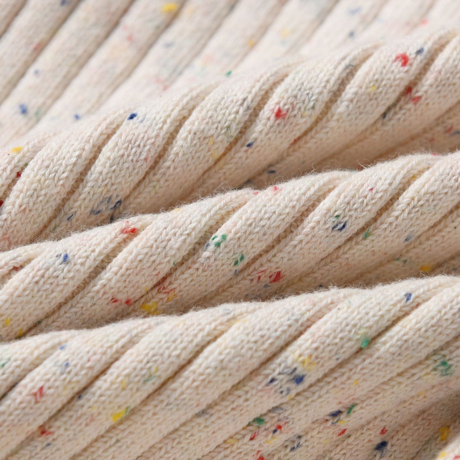 Almond Speckle Knitted Cotton Baby Jumpsuit Fabric Detail - Bambisserie