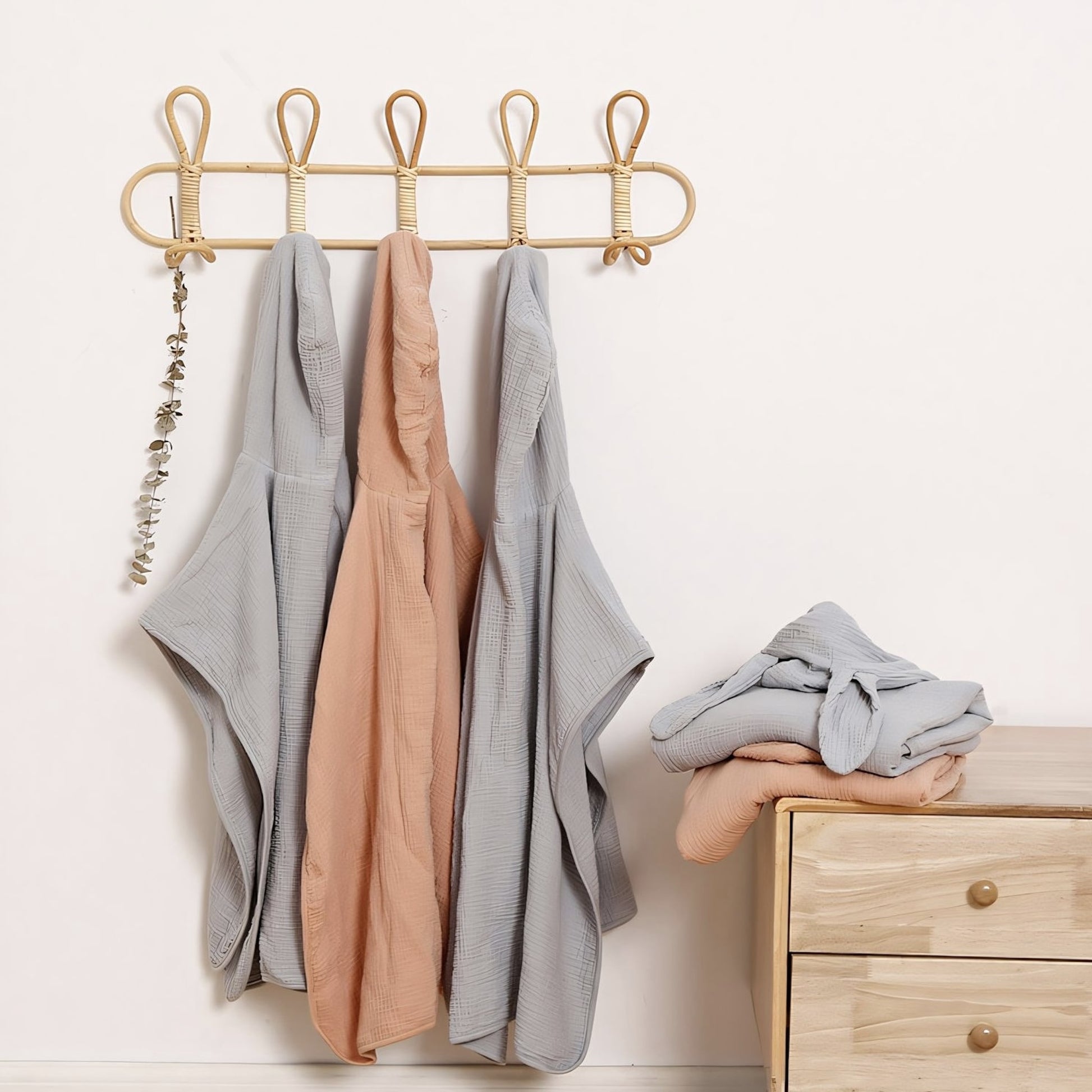 Rabbit Ears Cotton Hooded Towel Ponchos hanging on wall