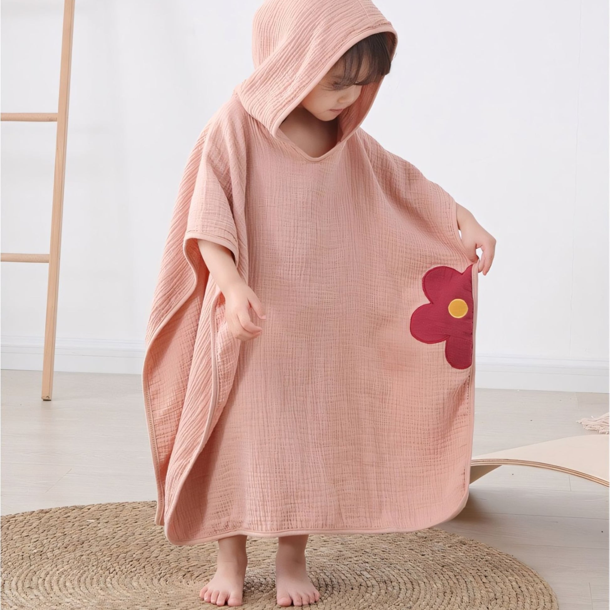 Girl wearing Little Flower Cotton Hooded Towel Poncho, Apricot - Bambisserie
