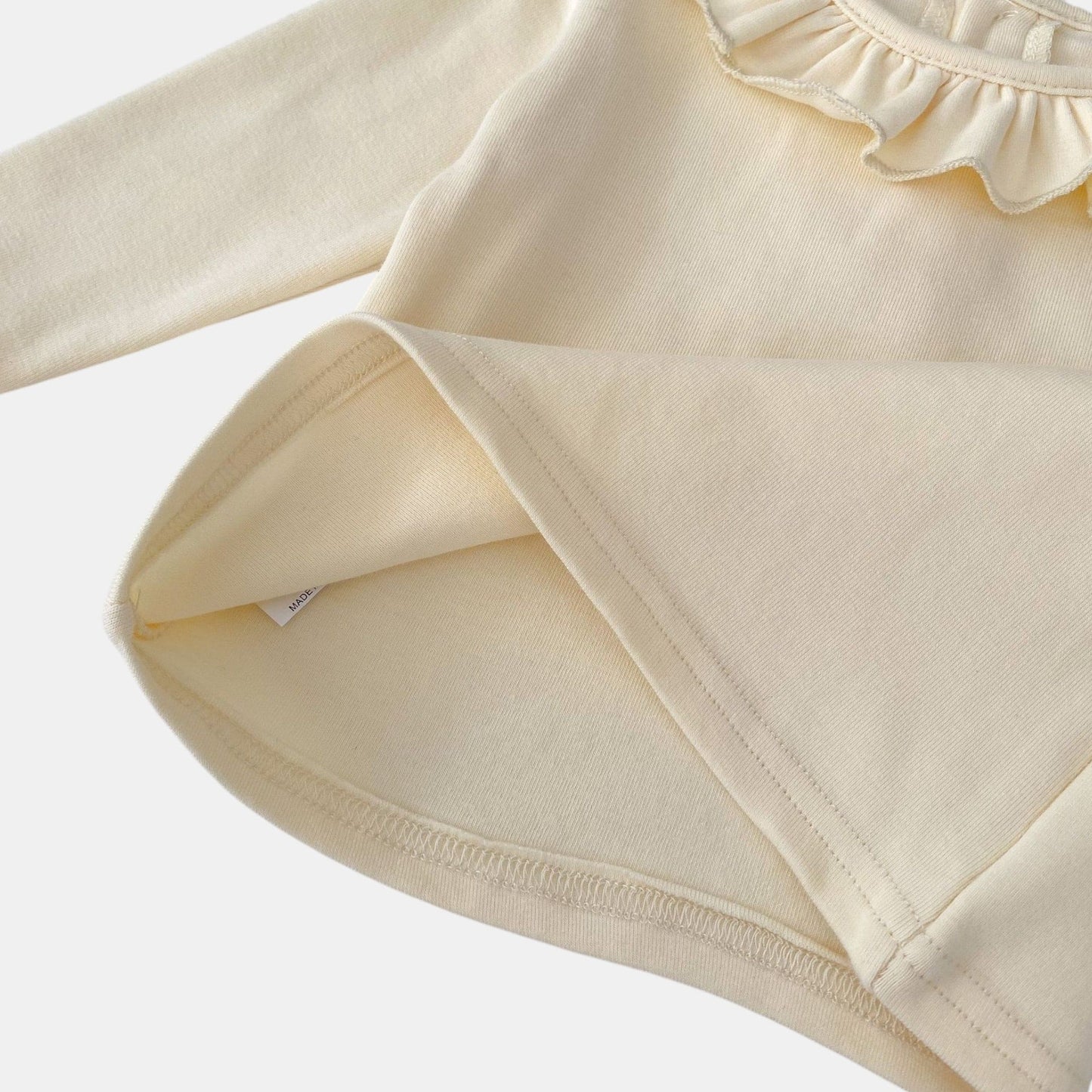 Lotus Ruffle Vanilla Cotton Top (3m-3yrs)