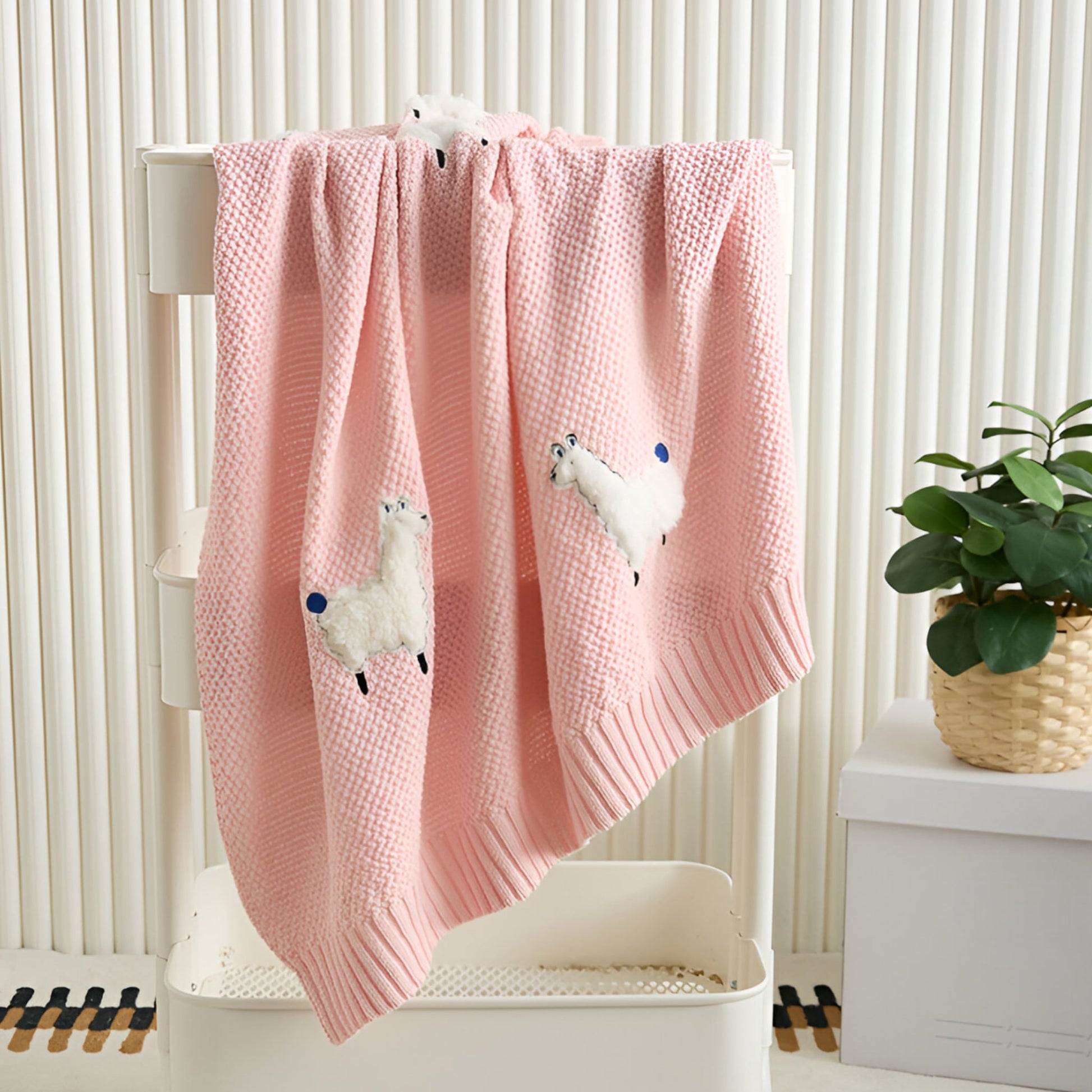 OEKO-TEX® Alpaca Knitted Cotton Blanket, Ballet Pink - Draped on white trolley - Bambisserie