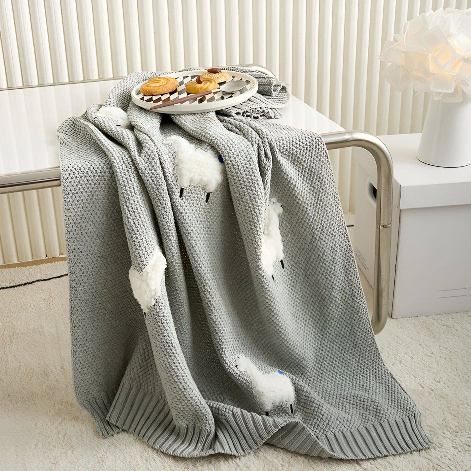 OEKO-TEX® Alpaca Knitted Cotton Blanket, Grey - Draped on side of table - Bambisserie