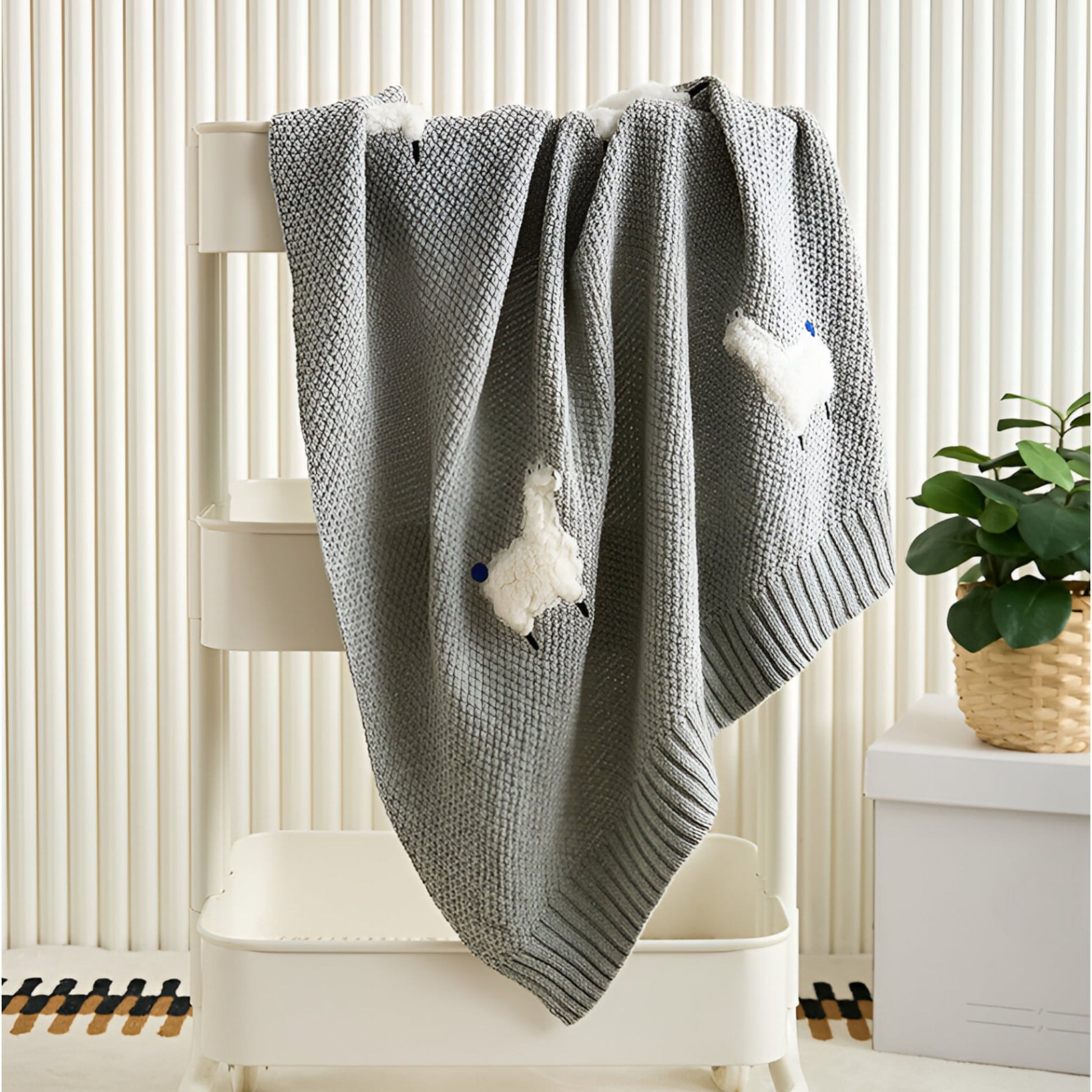 OEKO-TEX® Alpaca Knitted Cotton Blanket, Grey - Draped over white trolley - Bambisserie