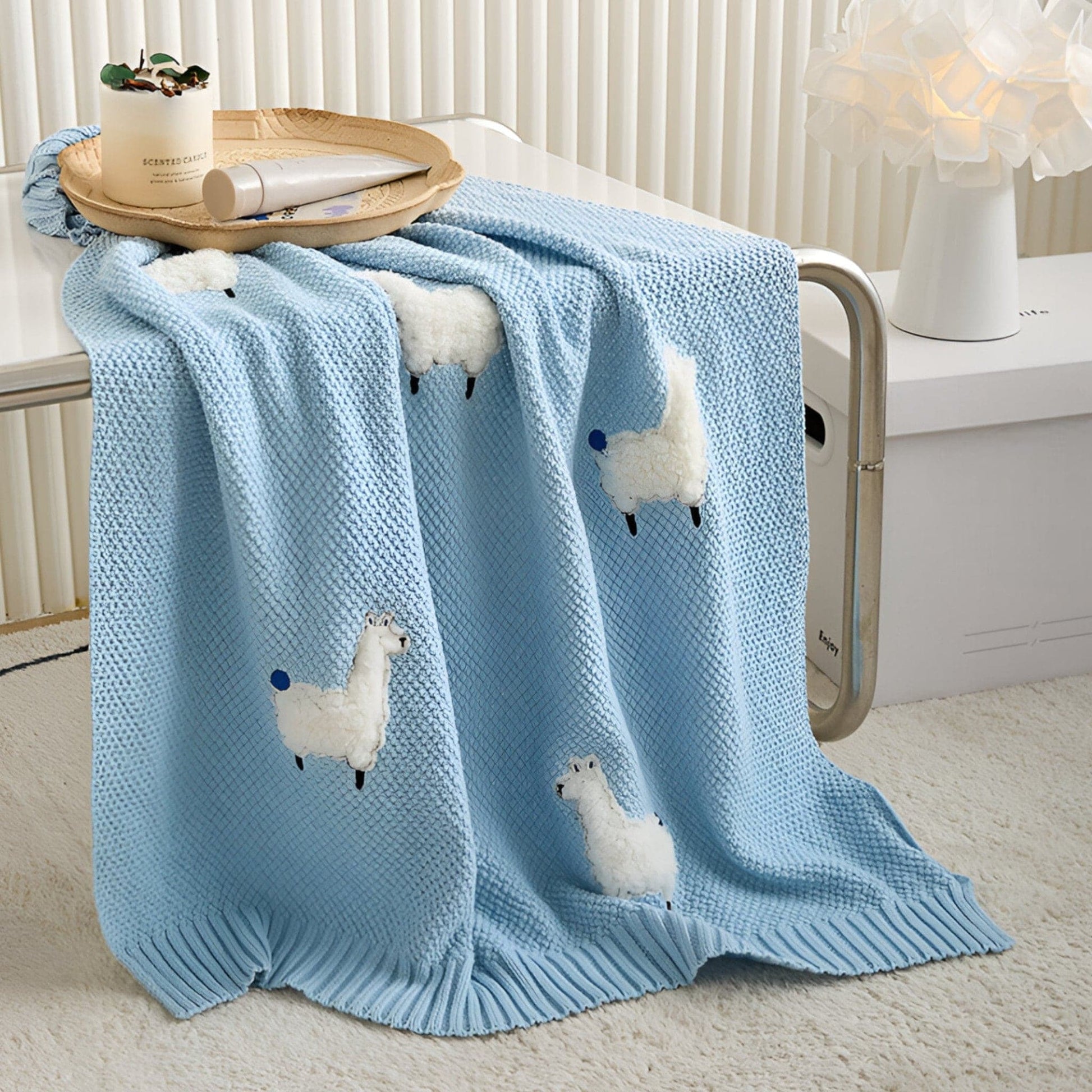 OEKO-TEX® Alpaca Knitted Cotton Blanket, Sky Blue - Draped on side of table - Bambisserie