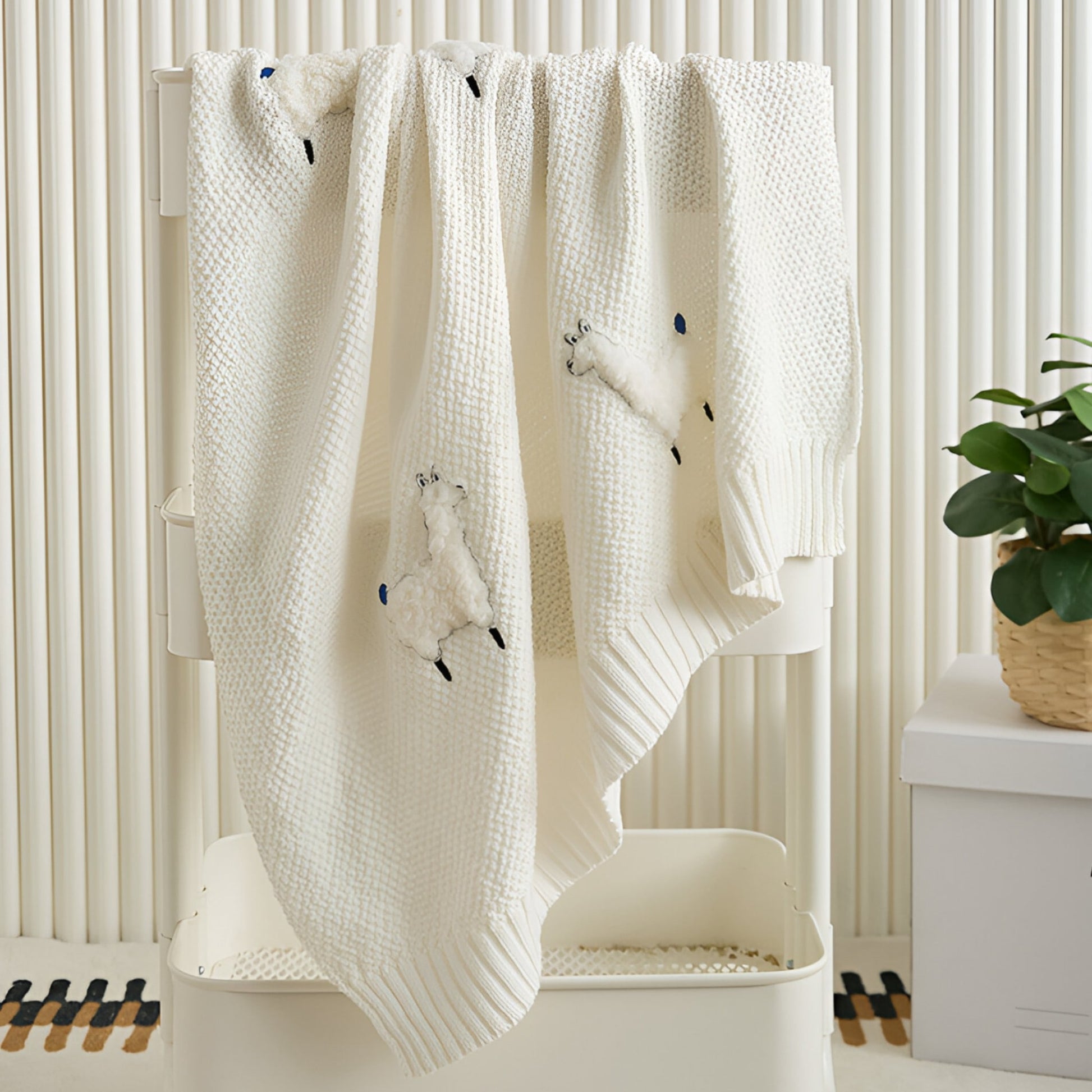 OEKO-TEX® Alpaca Knitted Cotton Blanket, White - Draped on white trolley - Bambisserie