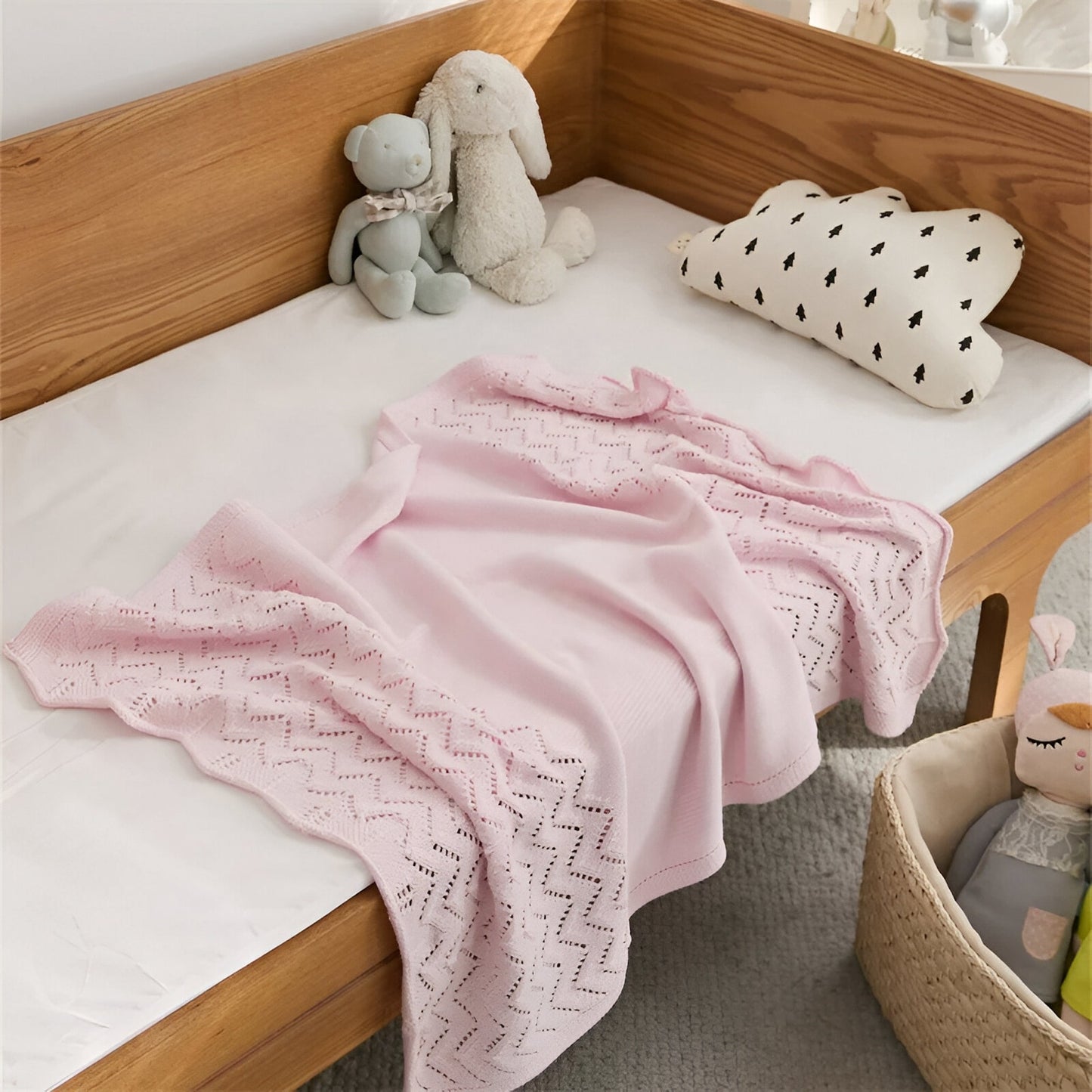 OEKO-TEX® Pink Chevron Knitted Cotton Blanket - Draped on side - Bambisserie
