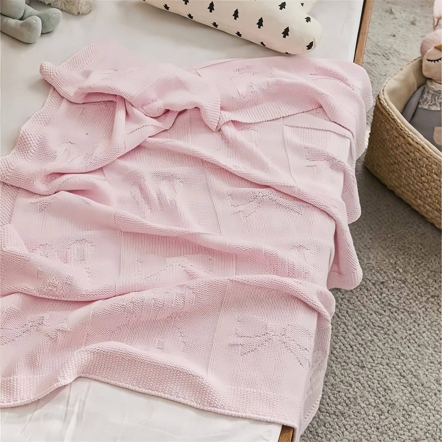 OEKO-TEX® Pink Bunny Knitted Cotton Blanket - Draped on side of bed - Bambisserie