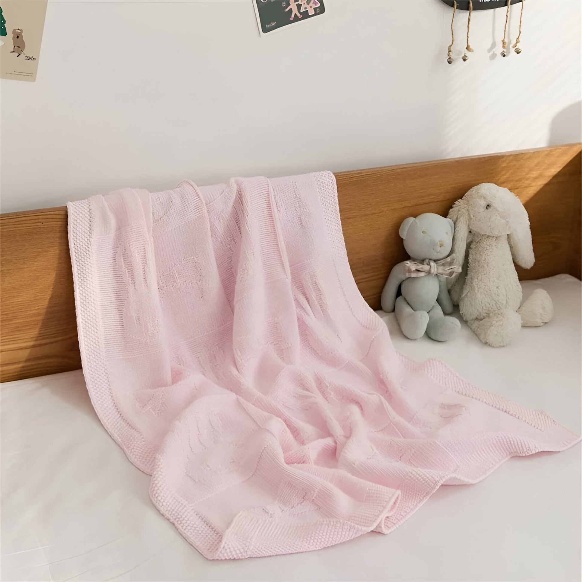 OEKO-TEX® Pink Bunny Knitted Cotton Blanket - Draped on bed - Bambisserie