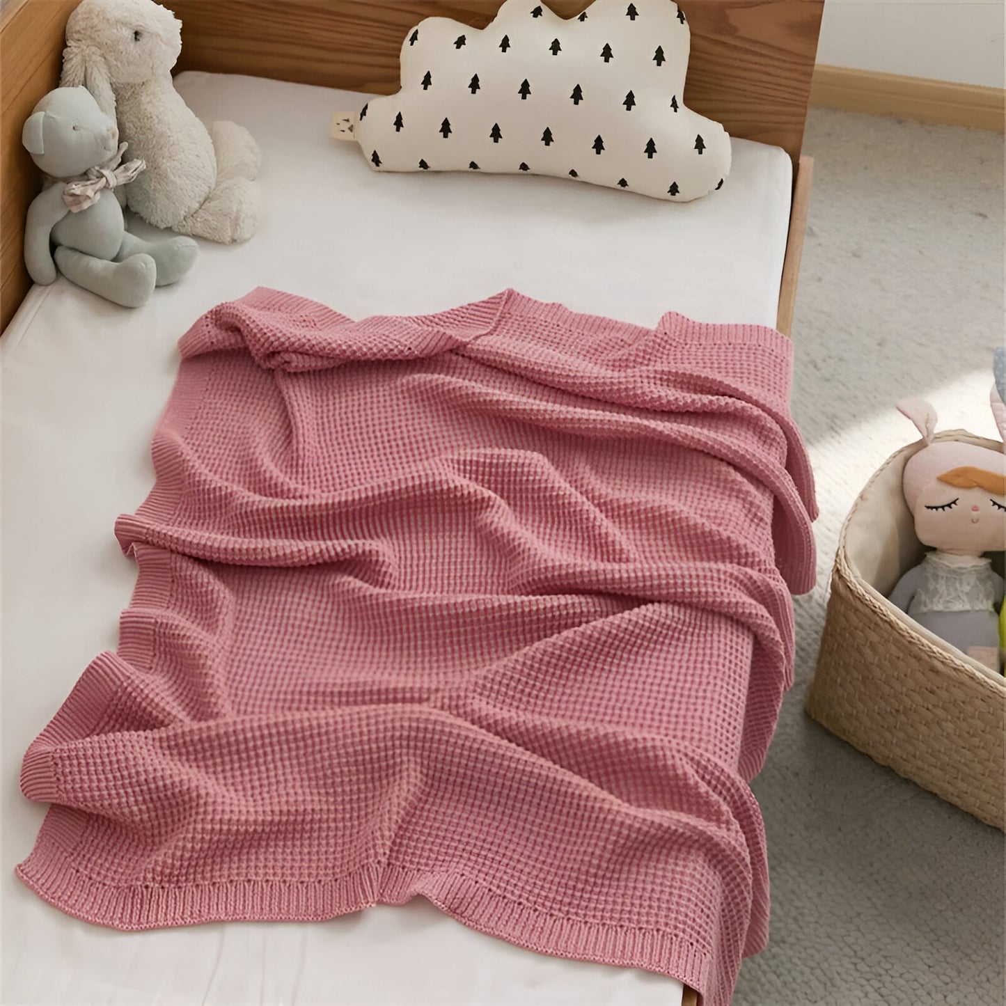 OEKO-TEX® Pink Waffle Knitted Cotton Blanket - On bed with teddies - Bambisserie