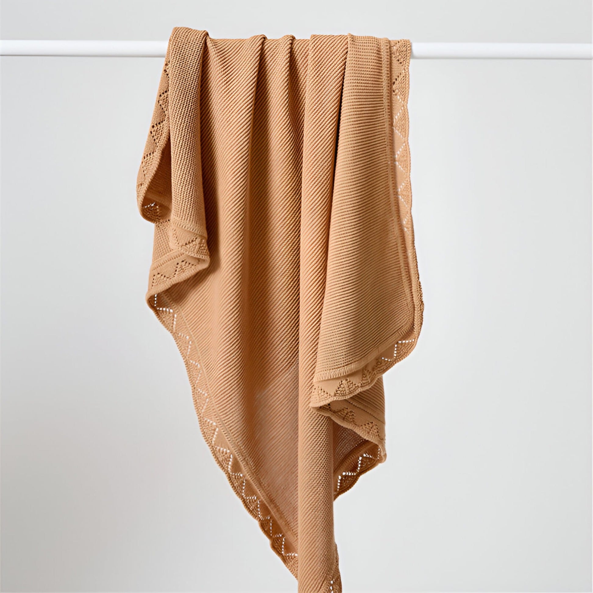OEKO-TEX® Lullaby Knitted Cotton Blanket, Hazelnut - Draped on pole - Bambisserie