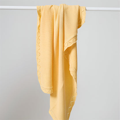 OEKO-TEX® Lullaby Knitted Cotton Blanket, Lemon Yellow - Draped on pole - Bambisserie