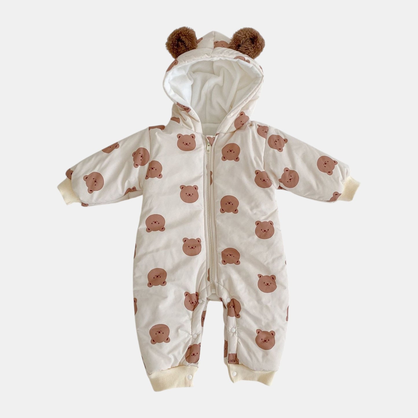 Baby pramsuit with bear pattern on a white background