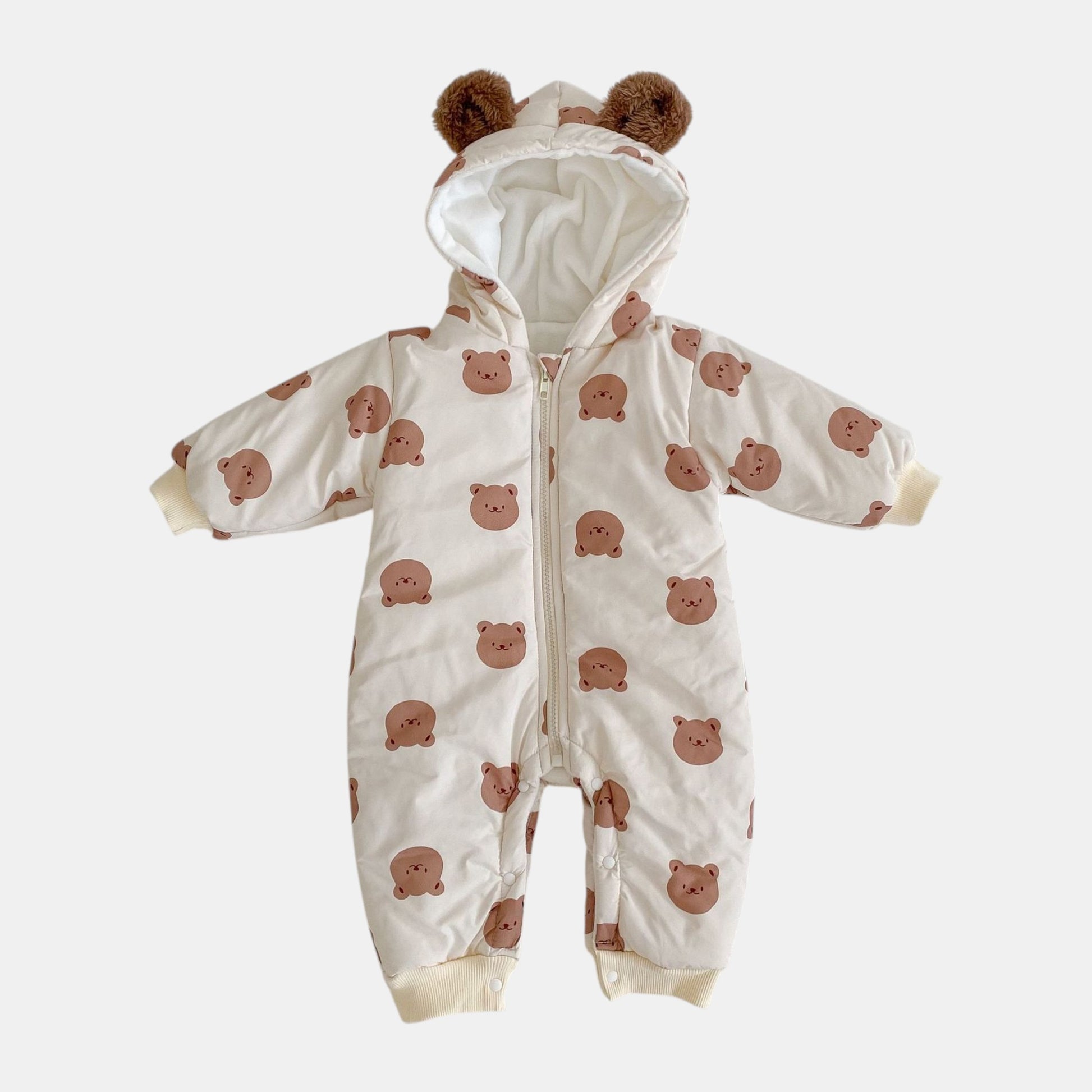 Baby pramsuit with bear pattern on a white background